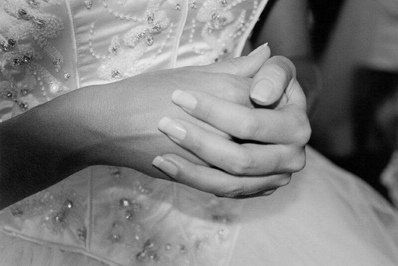 Fine art wedding photographer captures black and white photo of bride's hands in London.